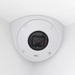 AXIS Q9216-SLV from AXIS COMMUNICATIONS - white, mounted in a corner with white walls